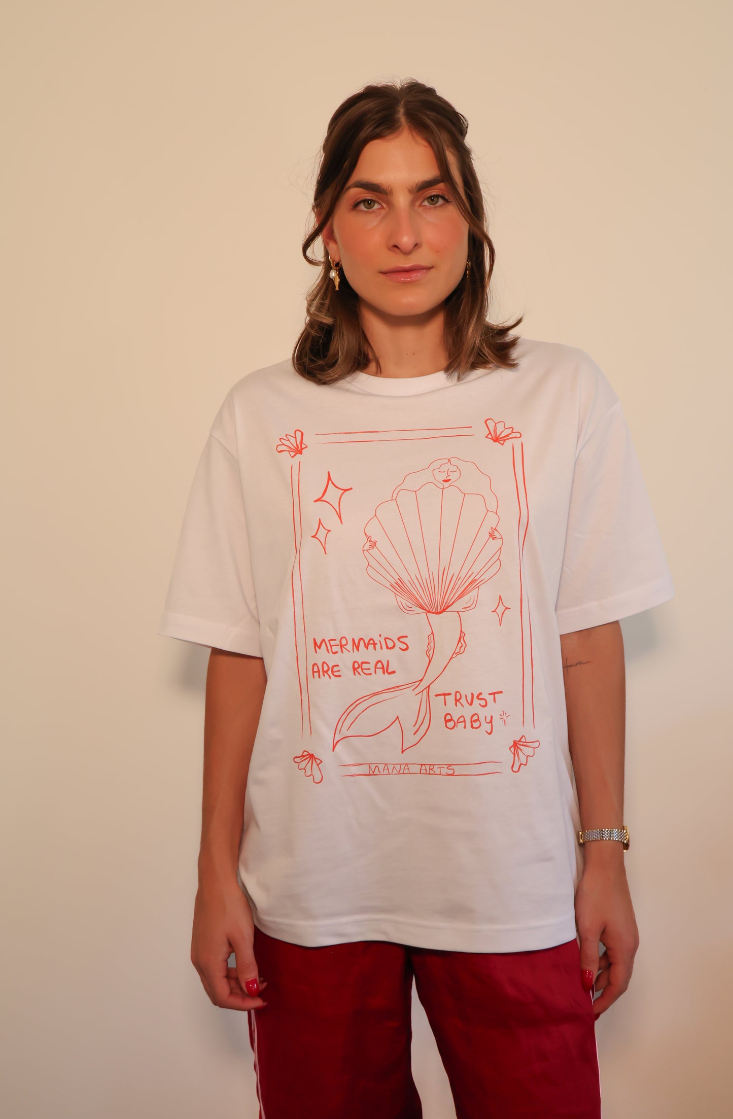 Mermaids are real  trust baby graphic t-shirt