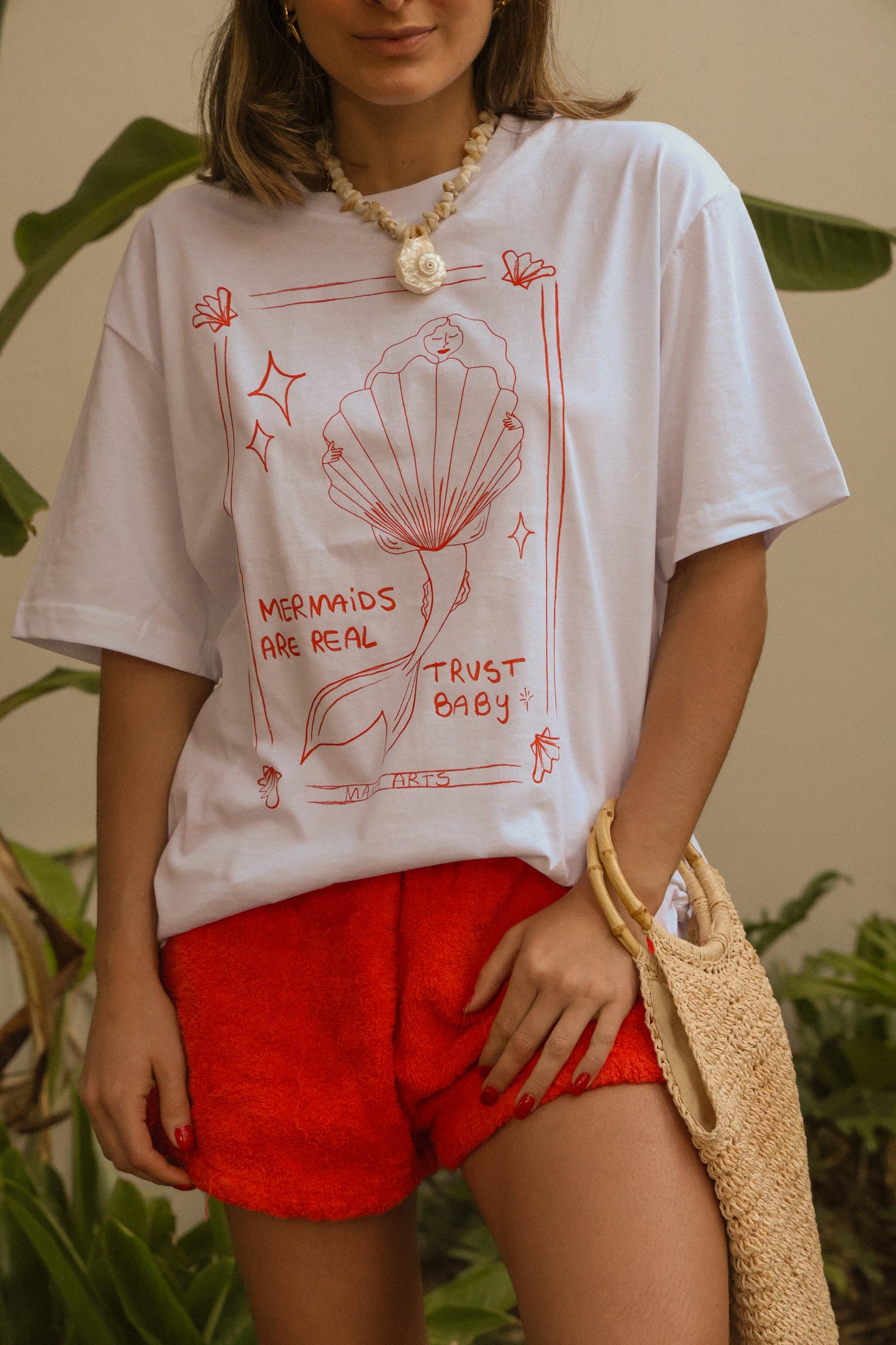 Mermaids are real  trust baby graphic t-shirt