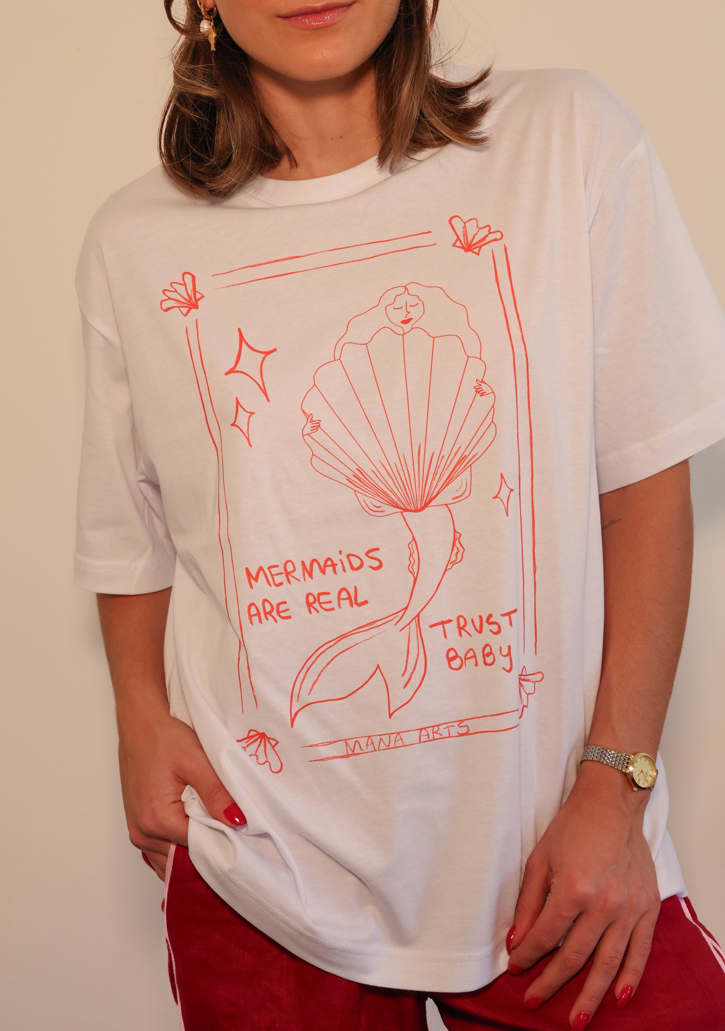 Mermaids are real  trust baby graphic t-shirt